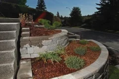 Borders - allan block europa collection abbey blend, with cedar mulch bed and assorted shrubs and perennials