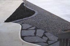 Borders - charcoal cobble mow brick with 20 mm rundle, black mulch and rundle flagstone pathway