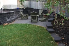steps - charcoal pisa II and revers a cap steps and retaining wall with cobblestone patio