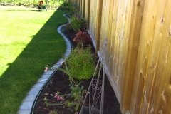 Borders - Assorted perennial garden with mow brick edging