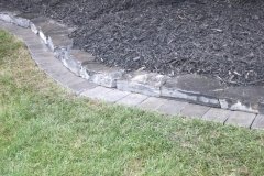 borders - charcoal roman euro mow brick with 3 inch rundle border and black mulch