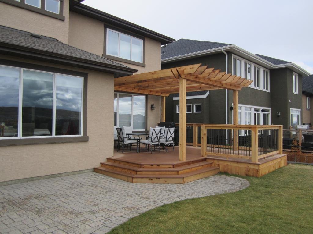 decks - composite deck with cedar pergola and railings with black aluminum spindles