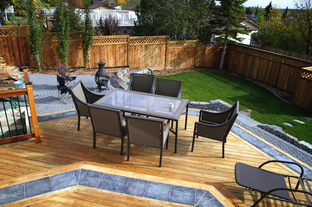 decks - tiered cedar deck with custom slate inlay border