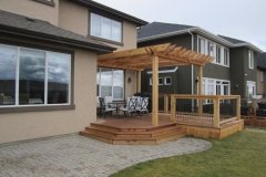 decks - composite deck with cedar pergola and railings with black aluminum spindles