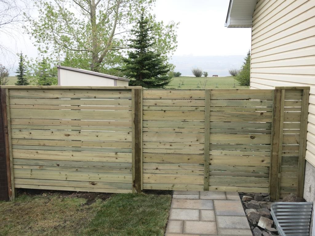 Fences - pressure treated horizontal slat fence and gate