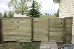 Fences - pressure treated horizontal slat fence and gate
