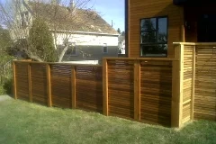 Fences - stained cedar horizontal slat fence