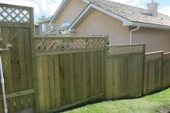 Fences - tiered pressure treated lattice topped estate style fence