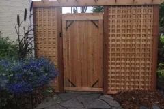 Gates - cedar arbor and privacy lattice panels surrounding gate