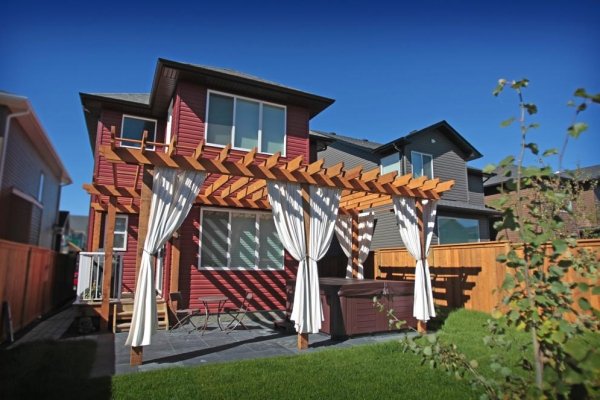 Pergola with outdoor curtains