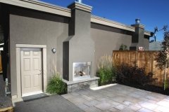 outdoor fire place and paving stone patio