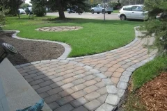 Front Door pathway and mow brick around bed using rustic cobble pavers with a charcoal accent / border