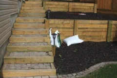 steps - 4 ft x 6 ft pressure treated steps and tiered retaining wall with rustic cobble pavers